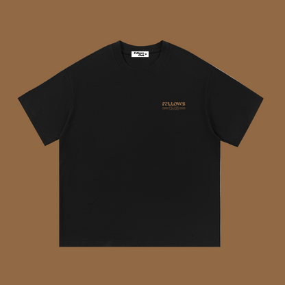 Black t-shirt with a small logo with text fellows club