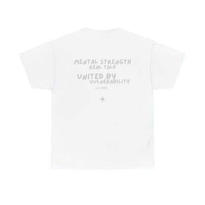 White t-shirt with silver text on a white background