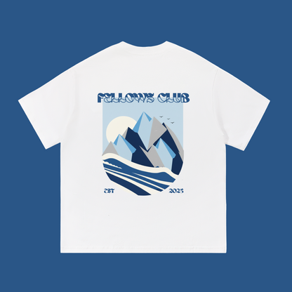 White t-shirt with mountain graphic and 'Fellows Club' text on a white background